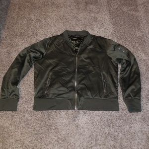 Green silky jacket with zipper on arm